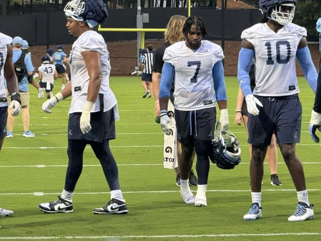 Kaimon Rucker (7) and Des Evans (10) started their final fall camp at UNC on Monday night. 