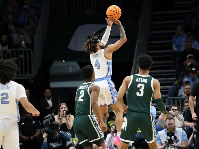 North Carolina UNC a 14-2 run late in the second half to pull away from Michigan State on Saturday.