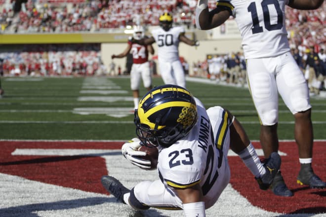 Michigan junior safety Tyree Kinnel picked off Indiana quarterback Peyton Ramsey in overtime.