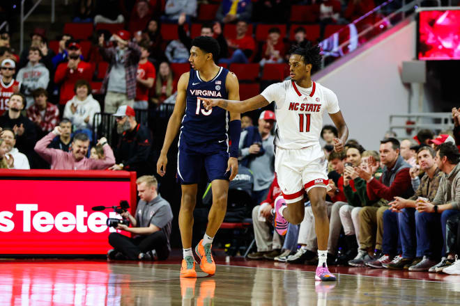 NC State freshman power forward Dennis Parker had 15 points and made three three-pointers in the Wolfpack's 76-60 win over visiting Virginia on Saturday.