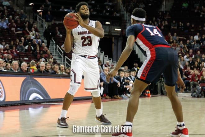 Evan Hinson, a tight end on South Carolina's FB team, debuted with the hoops team on Saturday