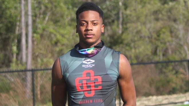 Alabama safety DaKaari Nelson holds a Michigan Wolverines football recruiting offer from Jim Harbaugh.