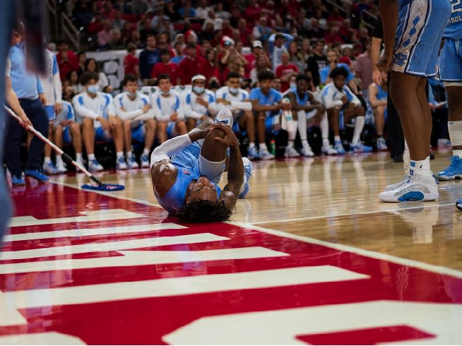 UNC senior Leaky Black left the game late in the first half with a hyperextended right knee.
