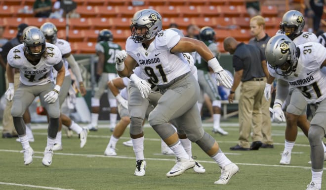 Eddy Lopez (91) back in 2015 during warmups when CU took on Hawaii