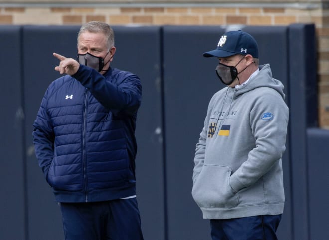 Notre Dame Fighting Irish football head coach Brian Kelly and recruiting coordinator Brian Polian