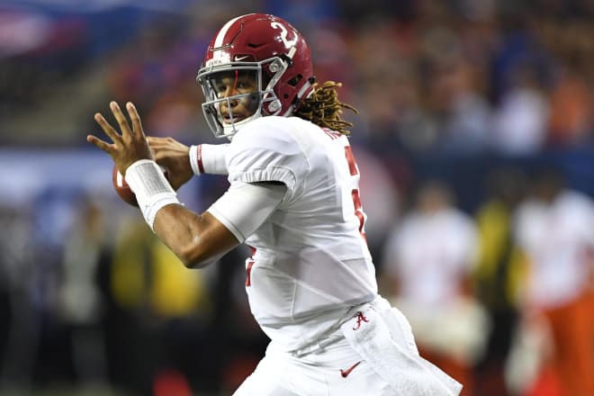 Alabama Crimson Tide quarterback Jalen Hurts (2) looks to pass during the second quarter of the SEC Championship college football game against the Florida Gators at Georgia Dome.