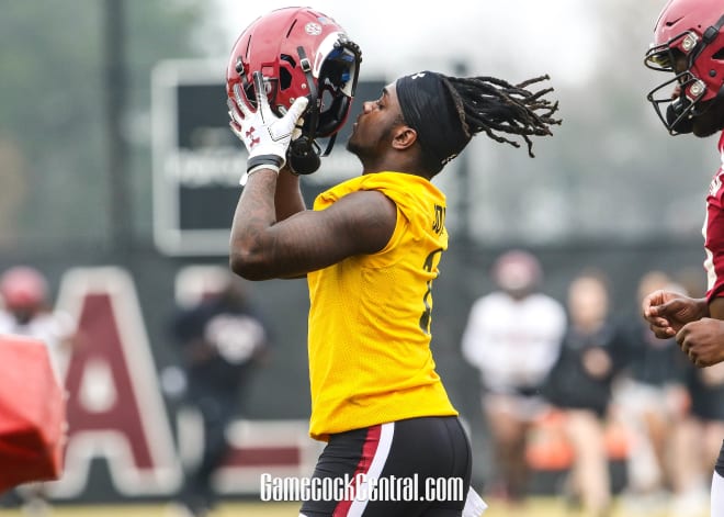 South Carolina wide receiver Dakereon Joyner puts on his helmet during spring practice.