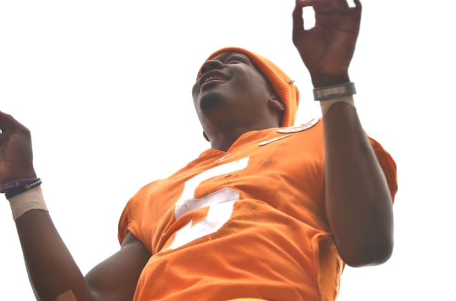 Tennessee quarterback Hendon Hooker leads the band in Rocky Top following his final appearance in Knoxville. 
