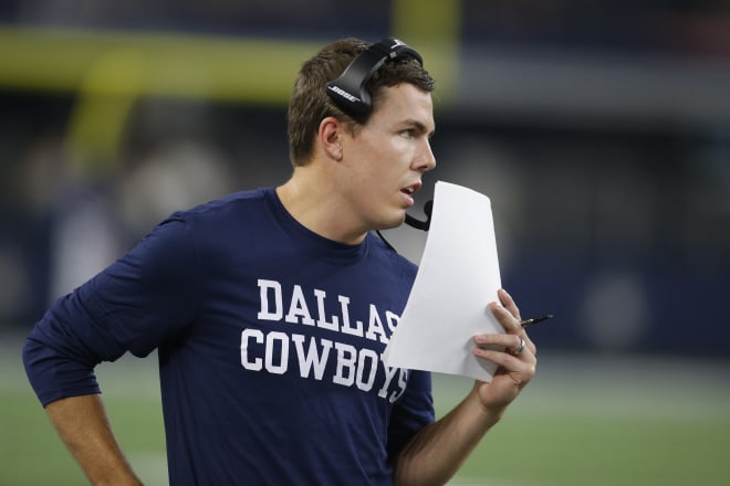 Dallas Cowboys offensive coordinator Kellen Moore on the field during the game against the Tampa Bay Buccaneers at AT&T Stadium. Photo Credit: Tim Heitman-USA TODAY Sports
