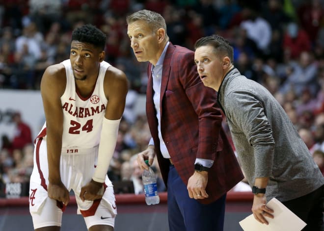  Alabama forward Brandon Miller (24) talks with Alabama head coach Nate Oats and assistant coach Charlie Henry at Coleman Coliseum. Photo | Gary Cosby Jr.-Tuscaloosa News / USA TODAY NETWORK