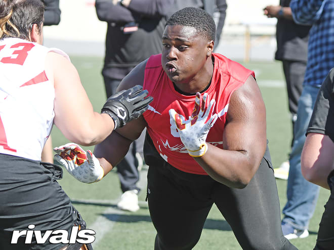 Three-star defensive tackle Ashton Sanders has a top two of Wisconsin and California. 