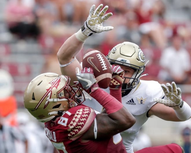 FSU tight end Camren McDonald hauls in a pass last season against Georgia Tech.