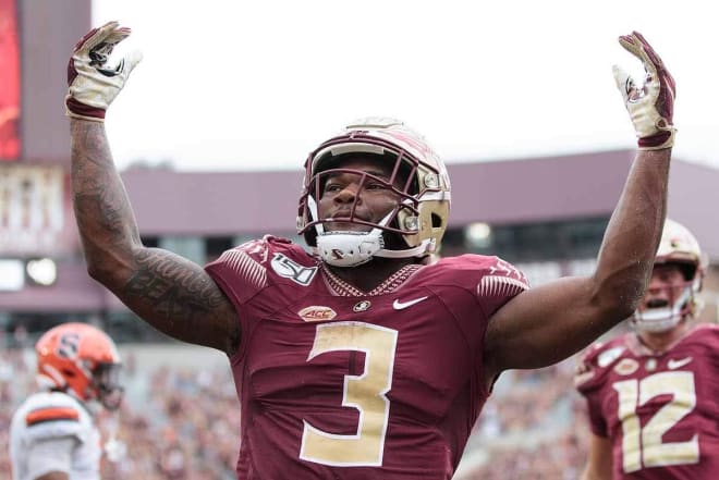 Cam Akers tied a school record with four touchdowns in Saturday's 35-17 win over Syracuse. 