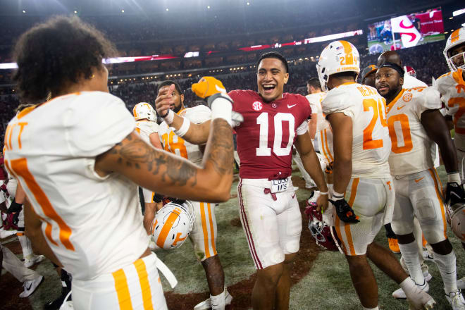 Alabama linebacker Henry To'oTo'o (10) greets former teammate/Tennessee wide receiver Jalin Hyatt (11) following a football game between the Tennessee Volunteers and the Alabama Crimson Tide at Bryant-Denny Stadium in Tuscaloosa, Ala., on Saturday.