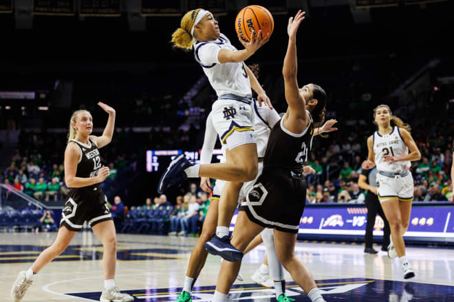 Notre Dame guard Hannah Hidalgo (3) goes up for a shot as Western Michigan forward Jasmine Elder (21) defends during ND's 84-47 win Thursday night at Purcell Pavilion.