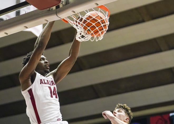 Alabama Crimson Tide center Charles Bediako (14) dunks the ball against the Vanderbilt Commodores during the second half at Coleman Coliseum. Photo | Marvin Gentry-USA TODAY