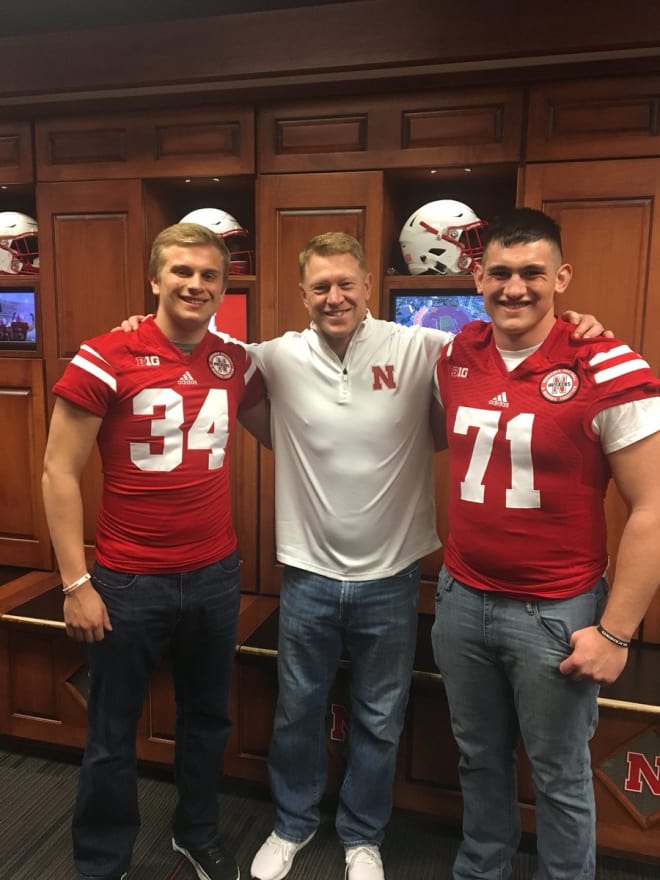 In-state Husker commits pose for a picture with head coach Scott Frost at the March 31 junior day.