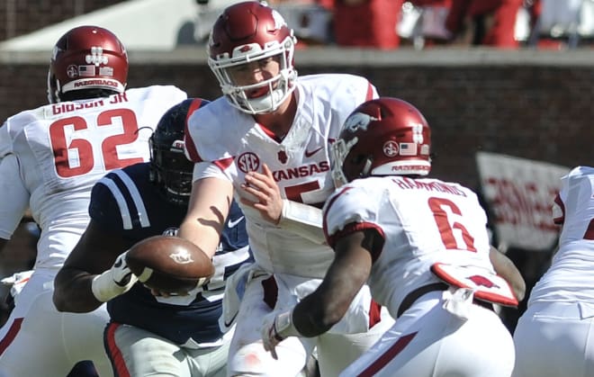 Cole Kelley hands off to T.J. Hammonds during last weekends' Ole Miss game