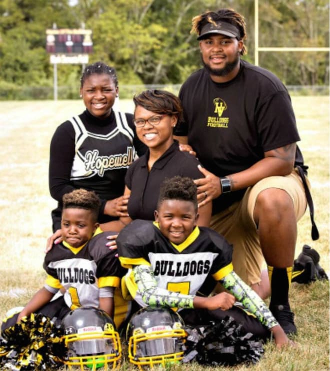 Bailey is shown here in recent years with his wife and children