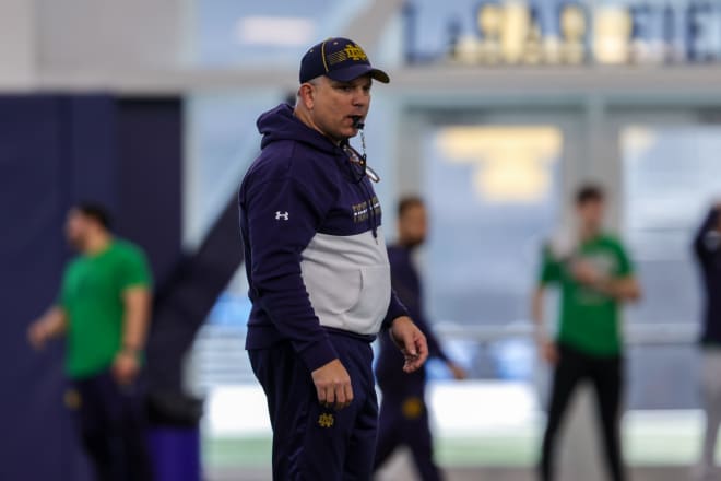 Notre Dame director of football performance Matt Balis keeps an eye on the Irish during a recent spring practice.