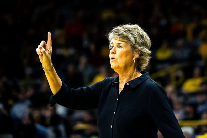 Lisa Bluder directs the action during an Iowa game. 