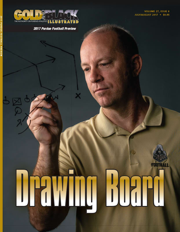 Jeff Brohm drew on a window at the Purdue West shopping center for this cover