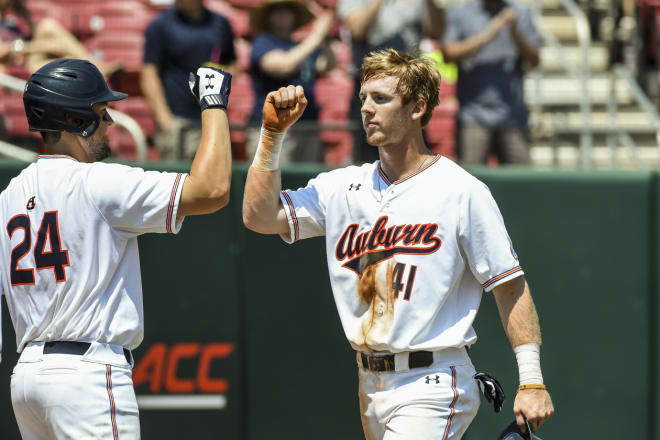 Williams is congratulated by Conor Davis after his majestic 3-run home run Friday.