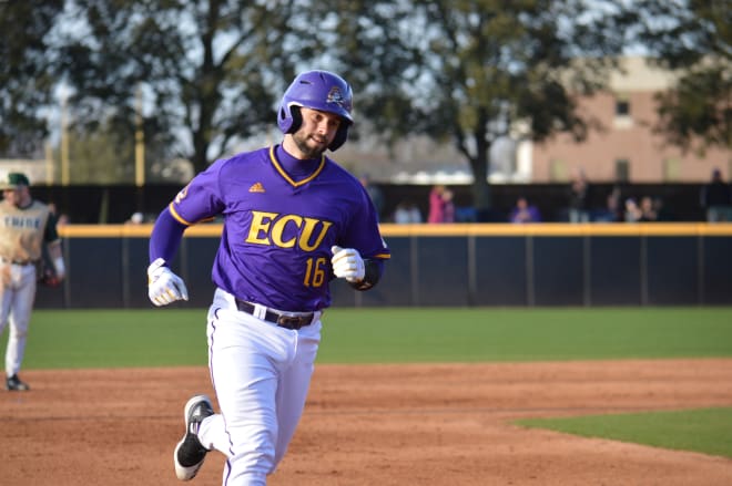 Matt James trots around the bases after his two run home run in the eight inning 