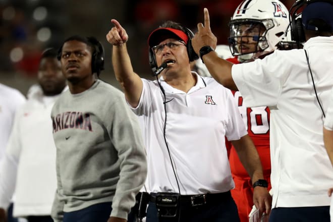 Arizona Wildcats head coach Jedd Fisch points at the score board after a fumble call in the first half at Arizona Stadium, Sep 30, 2023; Tucson, Arizona.
