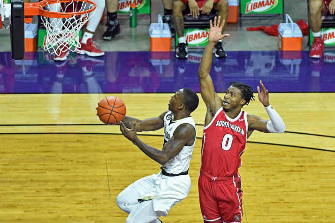 McKinley Wright IV scores a layup in transition 