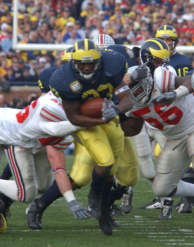 Perry was a true workhorse back for the Wolverines, and holds the school records for rushing attempts in a game and a season.