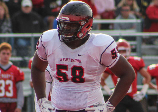 Kentwood (Mich.) East Kentwood four-star defensive tackle Mazi Smith has committed to Michigan.