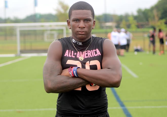 Virginia safety Sherrod Covil holds a Michigan Wolverines football recruiting offer from Jim Harbaugh.