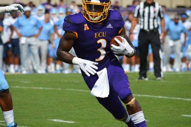 ECU running back Anthony Scott finds daylight on a six-yard touchdown run in the Pirates' 41-19 win over UNC.