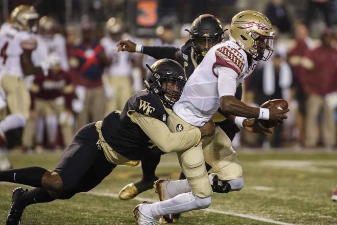 James Blackman gets sacked in the Seminoles' 22-20 loss at Wake Forest on Saturday night.