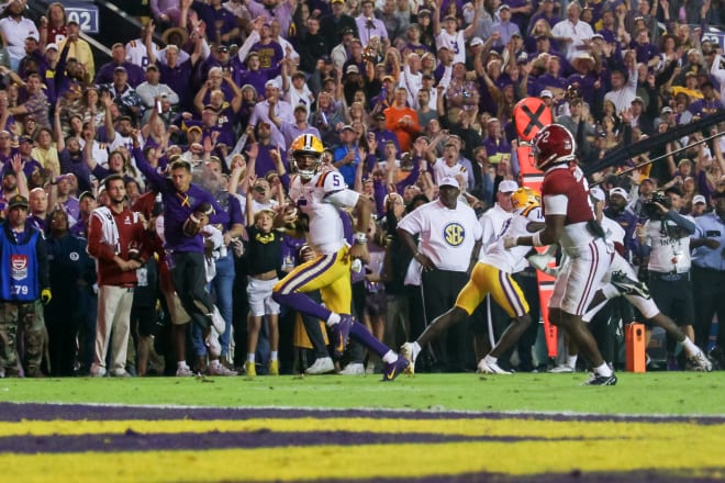 LSU QB Jayden Daniels runs for a 25-yard touchdown on the Tigers' first offensive snap to set up his game-winning 2-point conversion pass to Mason Taylor in LSU's 32-31 overtime win over Alabama Saturday night in Tiger Stadium.