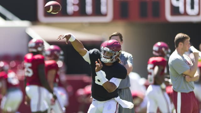 Alabama quarterback Jalen Hurts throws a pass during practice before the Crimson Tide's first scrimmage on Saturday. Photo | Laura Chramer