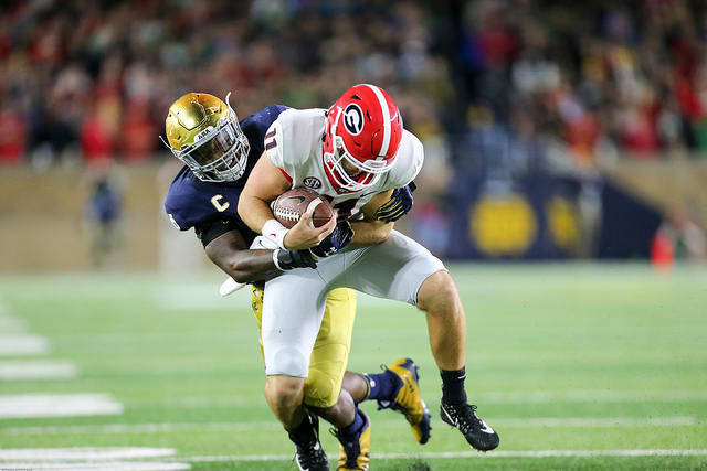 Notre Dame's defense played well enough to win, such as this sack by Nyles Morgan of Jake Fromm.