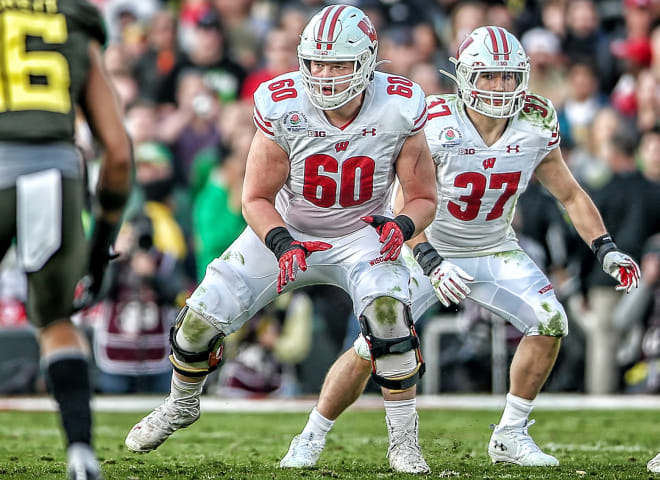 Logan Bruss (60) bumped back out to right tackle during spring practices