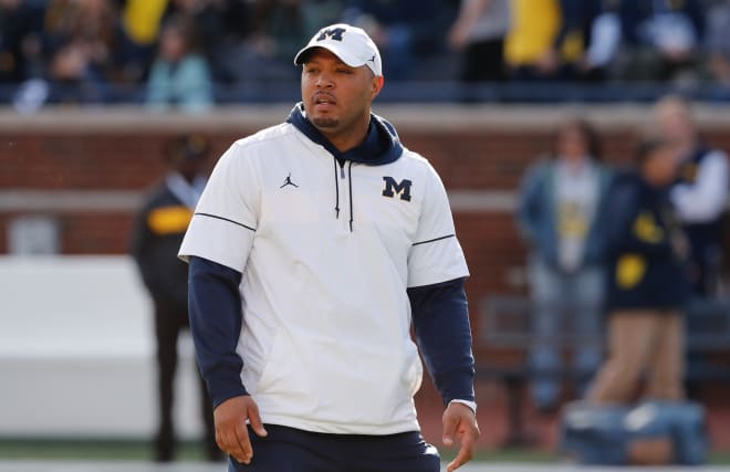 Josh Gattis worked the sideline hard after coming down out of the press box for Rutgers.