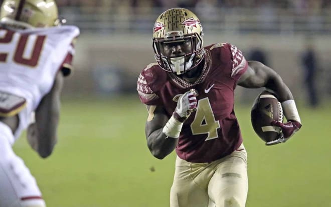 Florida State star tailback Dalvin Cook ranks sixth nationally in carries, rushing yards and touchdowns this season.