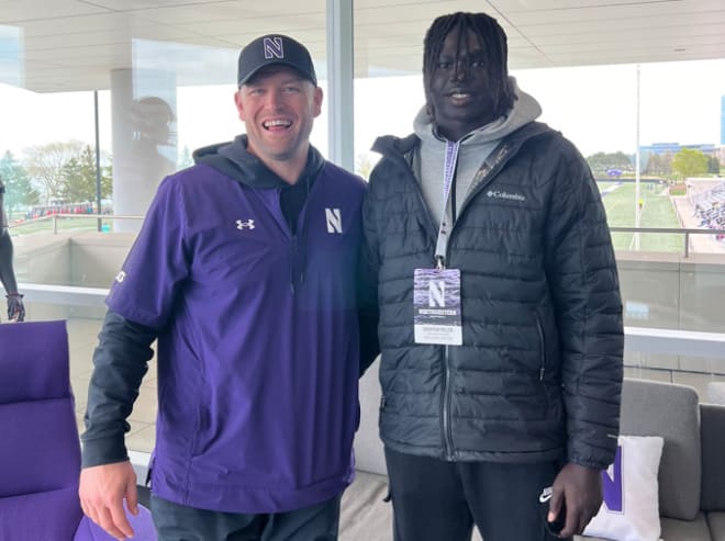Bodpegn Miller poses with Northwestern head coach David Braun during his visit on April 20.