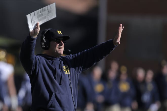 Michigan Wolverines head football coach Jim Harbaugh has won 49 games at U-M.