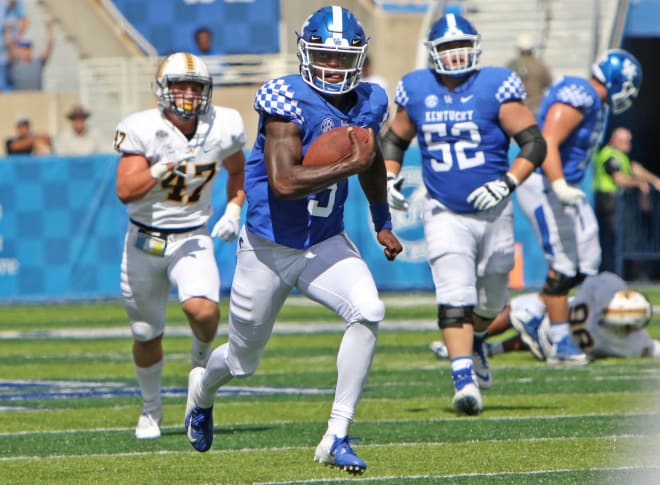 Kentucky quarterback Terry Wilson broke free on a 42-yard touchdown run to cap the Wildcats' first drive of the game.