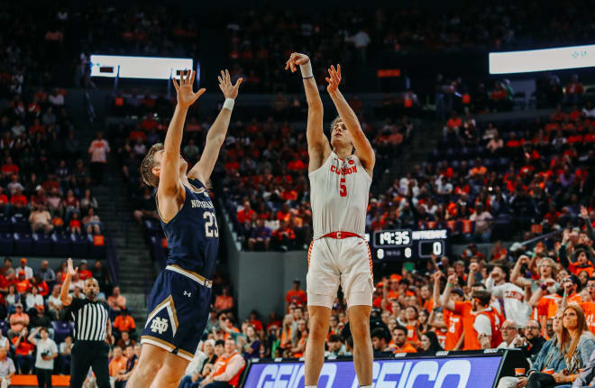 Clemson's Hunter Tyson (5) shoots over Notre Dame's Dane Goodwin (23) in the Tiger's 87-64 rout on Saturday night.