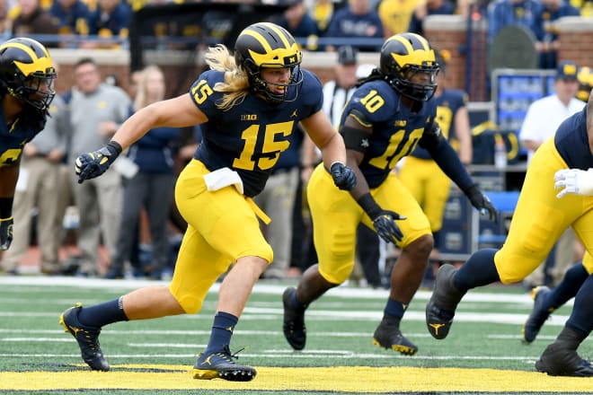 Devin Bush (No. 10) and Chase Winovich (15) have been standouts for the Michigan defense this year.