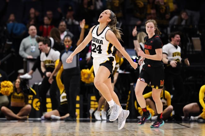 Mar 4, 2023; Minneapolis, MINN, USA; Iowa Hawkeyes guard Gabbie Marshall (24) reacts to her shot against the Maryland Terrapins during the second half at Target Center. 
