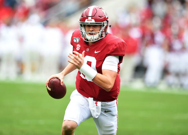 Alabama Crimson Tide quarterback Mac Jones (10) scrambles up the field against the Western Carolina Catamounts during the second quarter at Bryant-Denny Stadium. Photo | Imagn