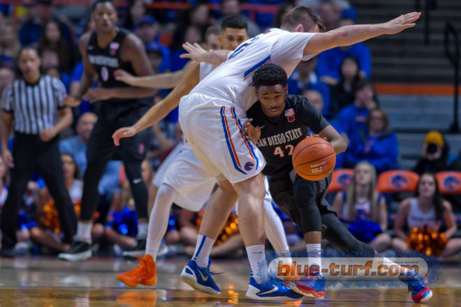 San Diego State's Jeremy Hemsley (42) is called for a charge as he runs into Boise State's Nick Duncan.