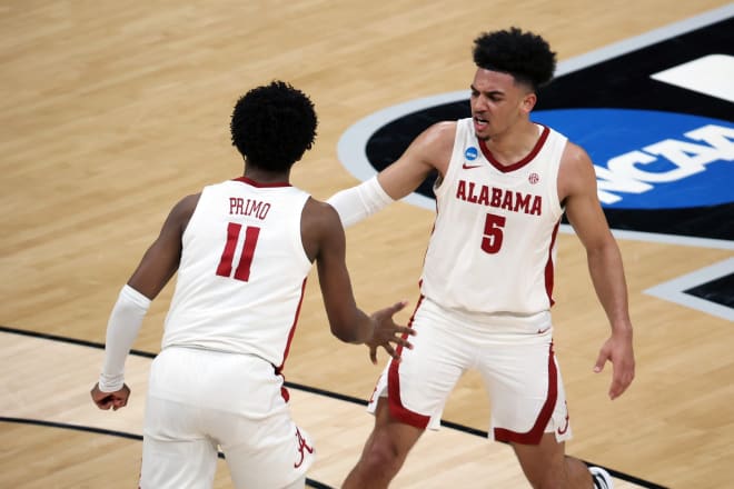 Alabama Crimson Tide guard Jaden Shackelford (5) and guard Joshua Primo (11) react after a play against the Maryland Terrapins in the second half in the second round of the 2021 NCAA Tournament at Bankers Life Fieldhouse. Photo | USA Today 